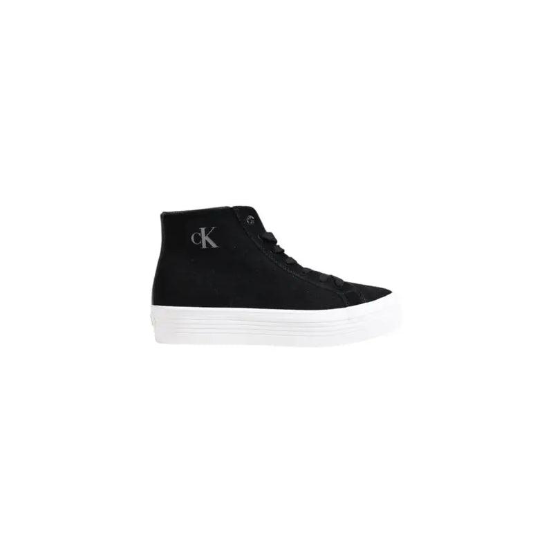 Black high top sneaker with white rubber platform sole and silver CK logo on the side