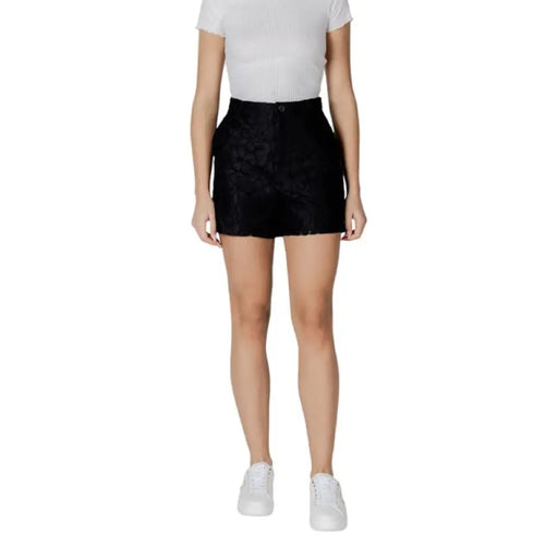 Black high-waisted shorts displayed in Women’s Black High Waisted Mini Skirt product image