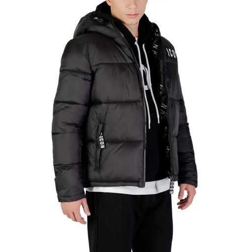 Black puffer jacket with hood and zipper, featuring a glossy finish.