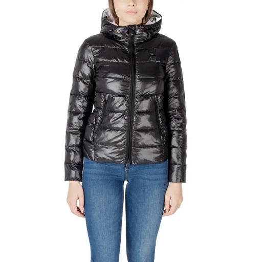Women’s black hooded puffer jacket displayed in a stylish winter outerwear presentation