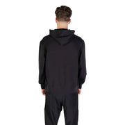 Calvin Klein black hoodie and matching sweatpants set displayed on a model