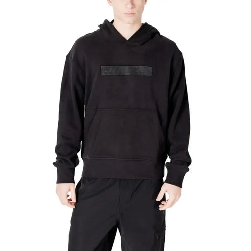 Black hooded sweatshirt from Calvin Klein Jeans for men, ideal for casual wear and comfort