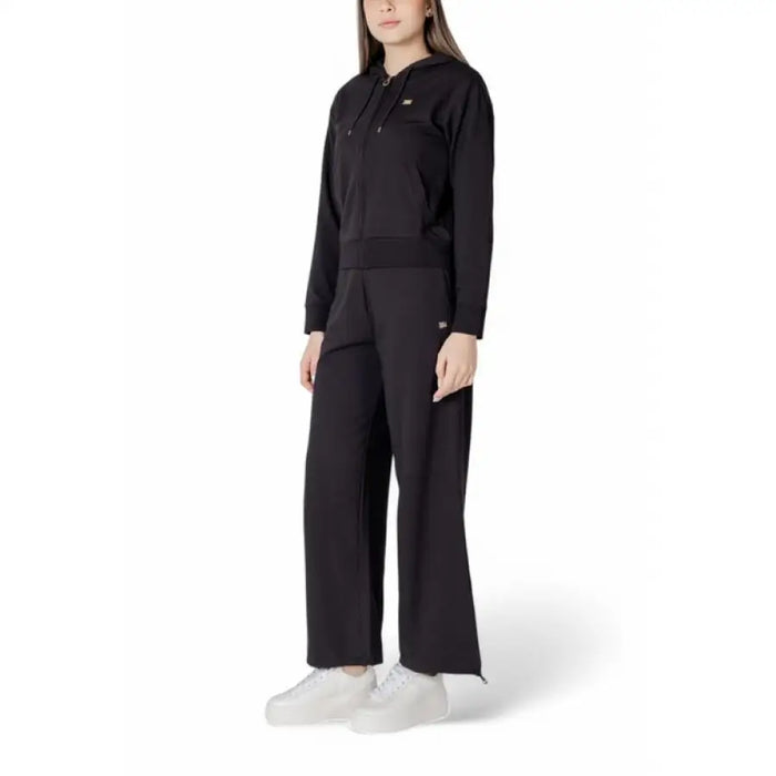 Black hooded tracksuit displayed for stylish athletic or casual wear