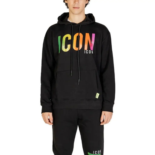 Black hoodie and sweatpants set with colorful icon design for stylish casual wear