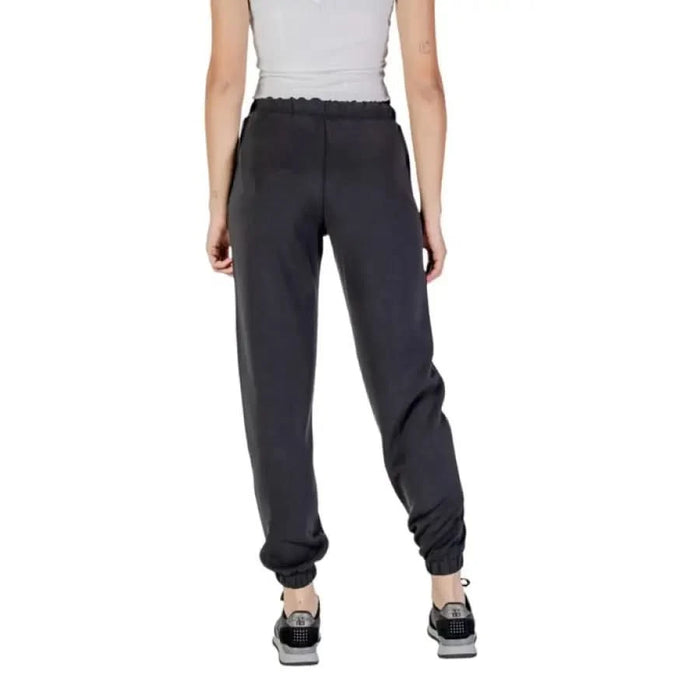 Black Guess Active Women’s jogger sweatpants with elastic cuffs and front pockets