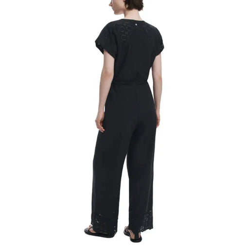 Black V neck embellished wrap jumpsuit with detailed embellishments and elegant design