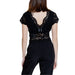 Elegant black lace top and pants outfit displayed in a stylish product image