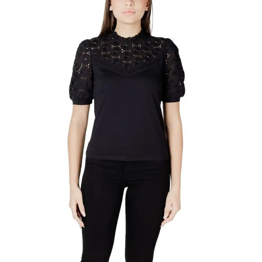 Black lace-trimmed top displayed with Women’s White Blouse with Lace Trim and Black Pants