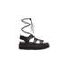 Black lace-up platform sandal displayed in a product image for Black Lace Up Platform Sandal
