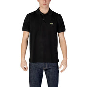 Polo Lacoste noir à manches courtes orné d'un logo crocodile vert sur la poitrine