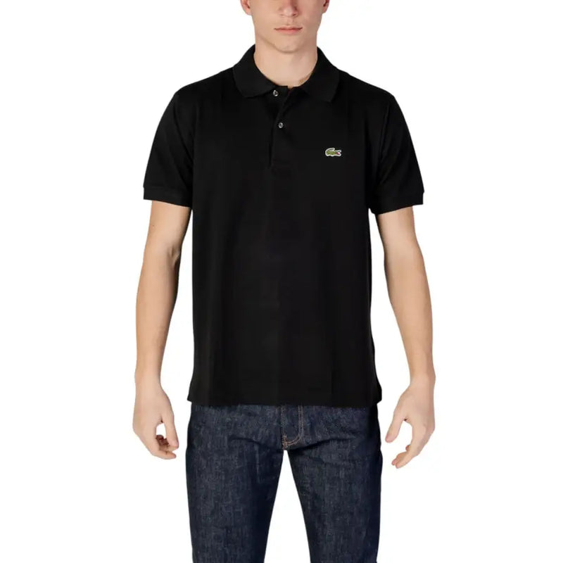 Polo Lacoste noir à manches courtes orné d'un logo crocodile vert sur la poitrine