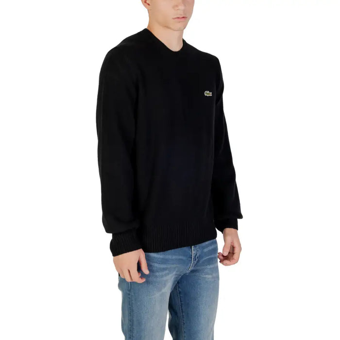 Black Lacoste long sleeve sweater displayed as a stylish and comfortable apparel piece