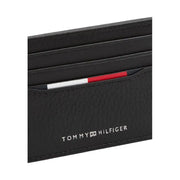 Black leather card holder from Tommy Hilfiger displayed on a white background