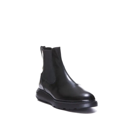 Black leather Chelsea boot for men showcasing classic stylish footwear design