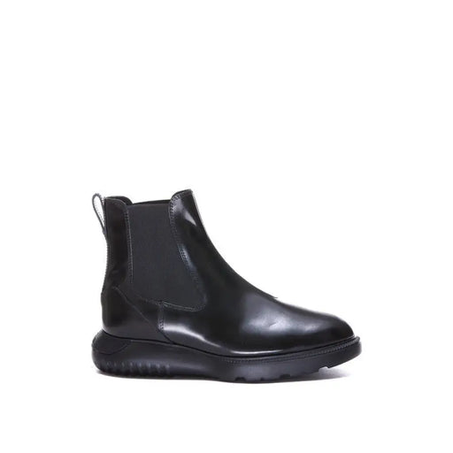 Black Leather Chelsea Boot displayed in a product listing on a retail website