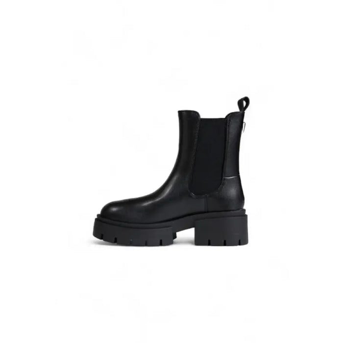 Black Leather Chelsea Boot displayed in a stylish product image