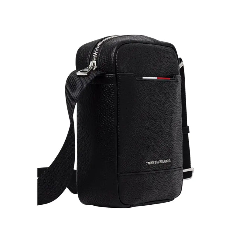 Black Leather Crossbody Bag by Tommy Hilfiger displayed with sleek design and adjustable strap