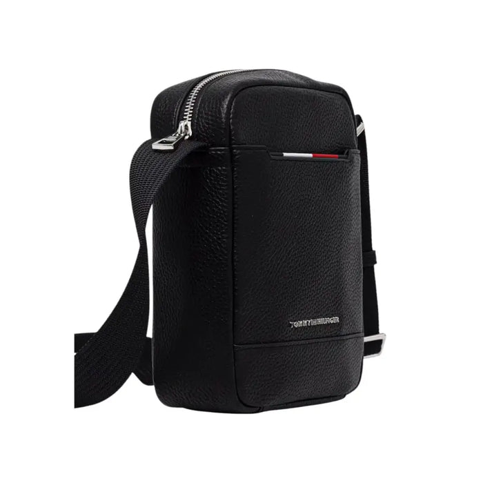 Black Leather Crossbody Bag by Tommy Hilfiger displayed with sleek design and adjustable strap