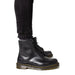 Black leather Dr. Martens boots for men, ideal for Fall Winter fashion