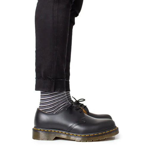 Black leather Dr. Martens Mens Lace Up Shoes showcasing durable style and comfort