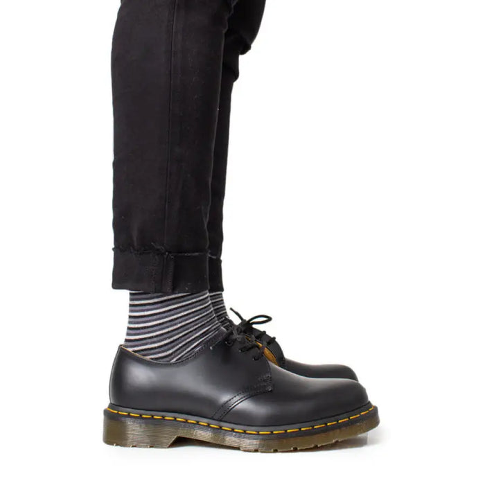 Black leather Dr. Martens Mens Lace Up Shoes showcasing durable style and comfort