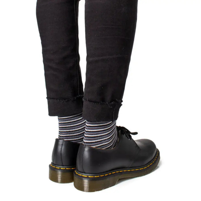 Black leather Dr. Martens Mens Lace Up Shoes showcasing classic style and durability