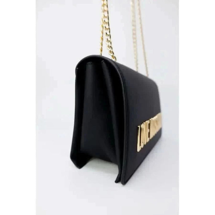 Black leather handbag with gold chain strap and metallic lettering by Love Moschino