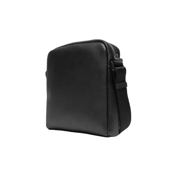 Black leather messenger bag with shoulder strap from Calvin Klein for men with zip closure