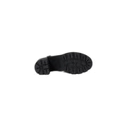 Black leather open toe heeled sandal showing the black rubber sole with chunky heel and deep tread pattern