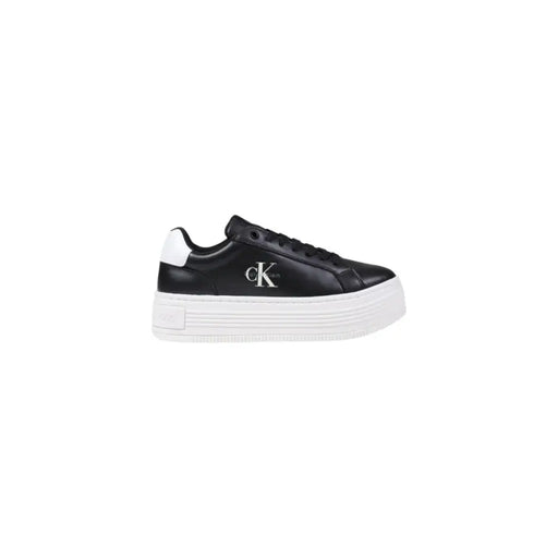 Black leather platform sneakers with white soles and heel accents from Calvin Klein Jeans Women