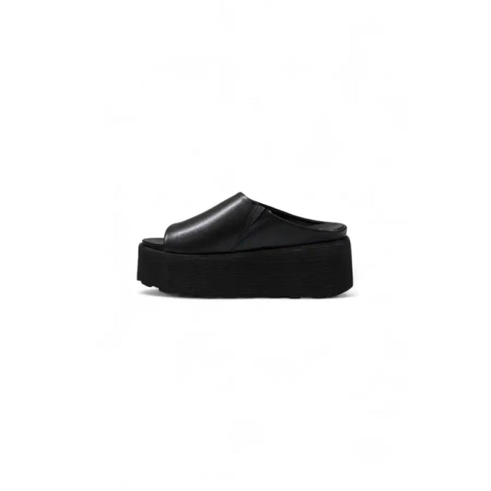 Black leather platform slide sandal for women with stylish and comfortable design