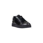 Black leather sneaker with white sole and laces, classic design.