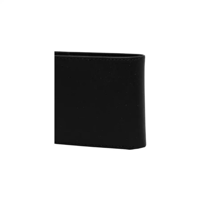 Black Calvin Klein leather wallet displayed on a plain background for product showcase