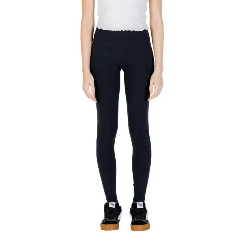 Black leggings with high-waisted ruffled waistband, stylish and comfortable for all occasions