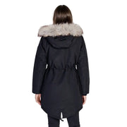 Black long hooded women’s fall winter jacket in black puffer with light gray faux fur hood and drawstring waist