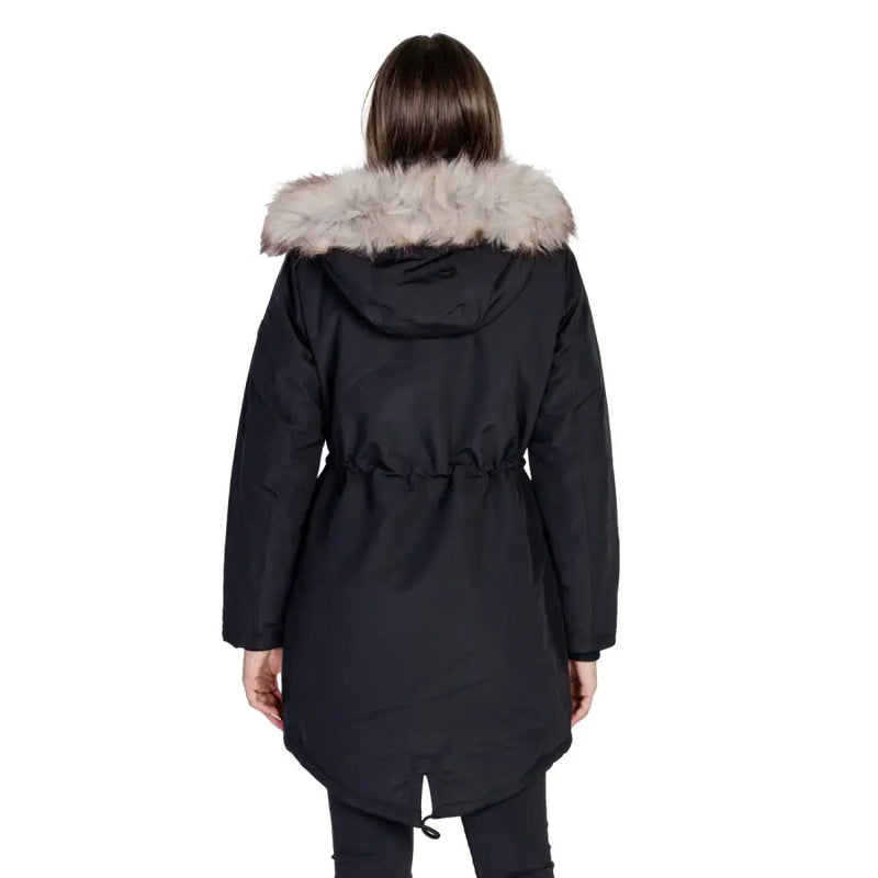 Black long hooded women’s fall winter jacket in black puffer with light gray faux fur hood and drawstring waist