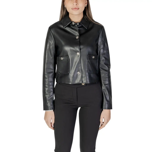 Black long polyurethane blazer featuring silver-toned buttons and two front flap pockets in faux leather material