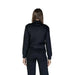 Black long-sleeved athletic jumpsuit displayed from behind in Guess Active product
