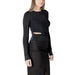 Black long-sleeved cutout top from Black Long Sleeve Cutout Ensemble