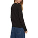 Black long-sleeved shirt displayed as a stylish and comfortable top for all occasions