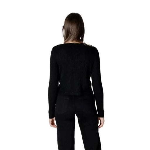 Black long-sleeved ribbed knit top and pants from Morgan De Toi Women’s collection