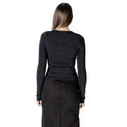 Black long-sleeved top and skirt from the Black Long Sleeve Cutout Ensemble collection