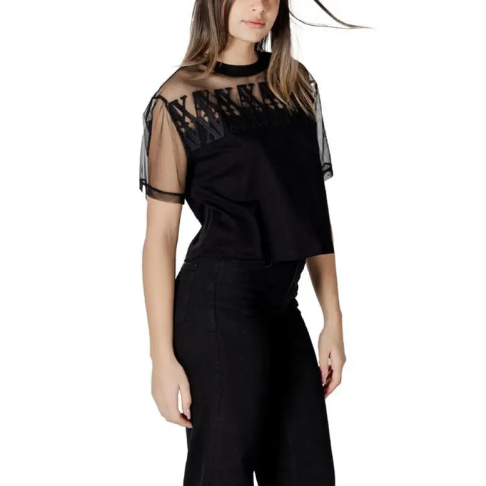 Black mesh-sleeved top from the Black Mesh Overlay Two Piece Set displayed front view