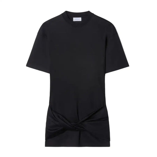 Black short-sleeved t-shirt with knotted hem detail styled with black mini dress and sculptural heels