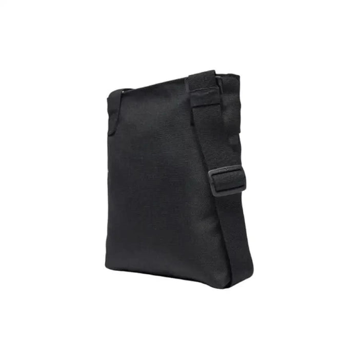 Black nylon messenger bag with adjustable shoulder strap from Calvin Klein for men