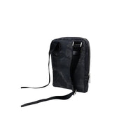 Black patterned crossbody bag featuring a world map design for stylish travel accessories
