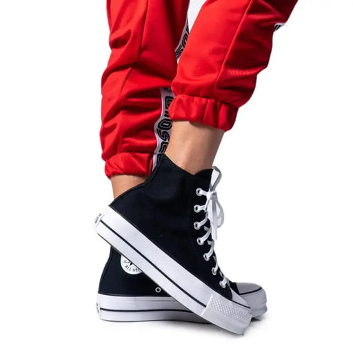 Black platform Converse Women Sneakers featuring print and laces for stylish comfort