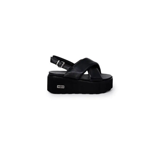 Black platform sandal displayed in a product image showcasing stylish footwear