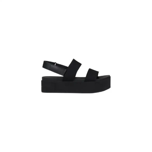 Black Platform Sandal showcasing a stylish and comfortable footwear option for women