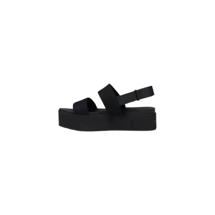 Black platform sandal displayed in a stylish footwear product image